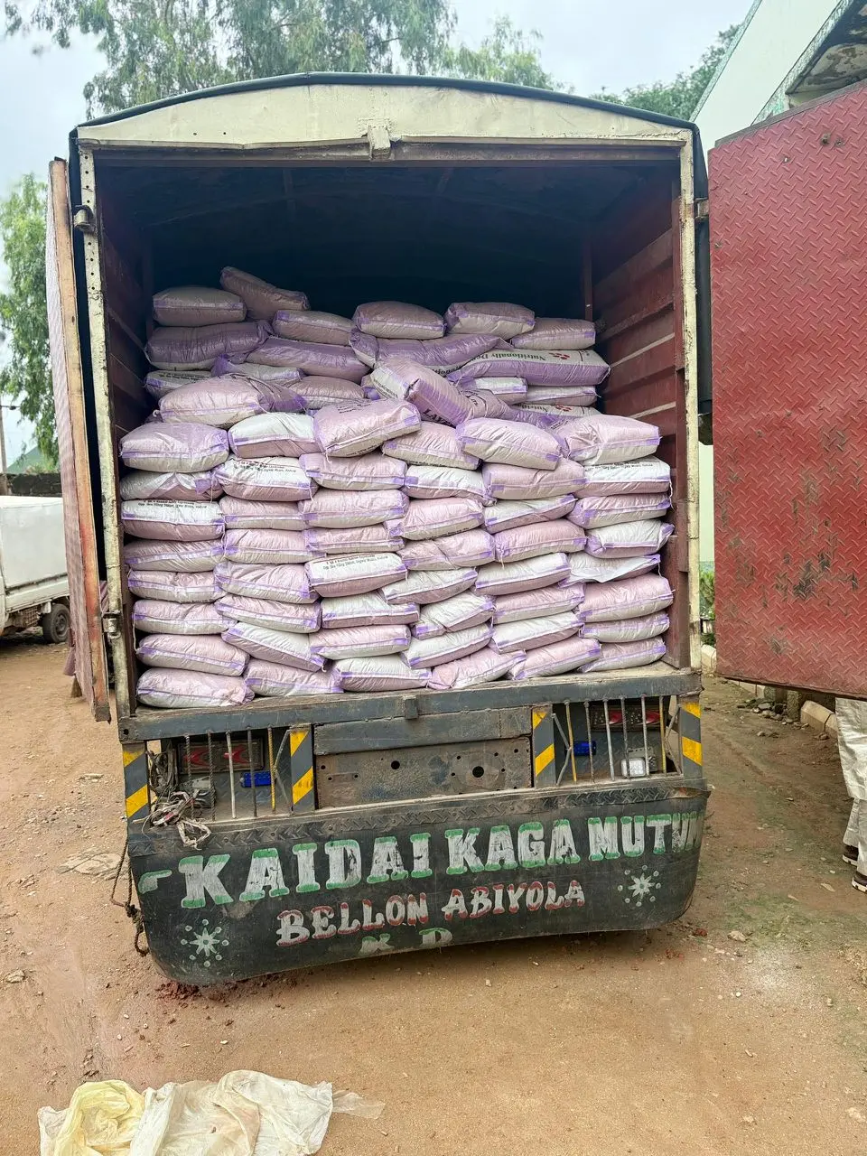 A delivery truck packed with Biotin Feeds bags
